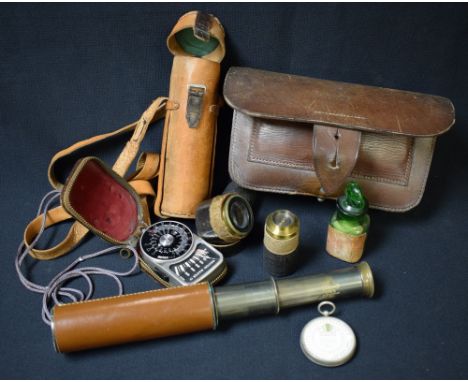 A WWI period leather first aiders kid; a Britannic four drawer telescope, light meter; other photographic equipment