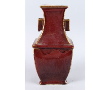 A CHINESE RED RECTANGULAR TWO HANDLED ARROW VASE, six character mark. 15ins high.
