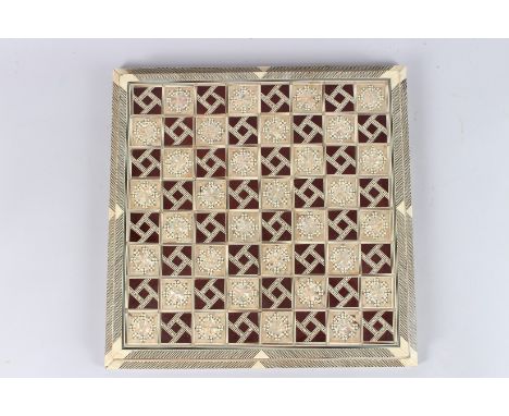 A VERY FINE AND LARGE SYRIAN MARQUESTRY BONE AND MOTHER-OF-PEARL INLAID CHESS BOARD. 17ins x 17ins.