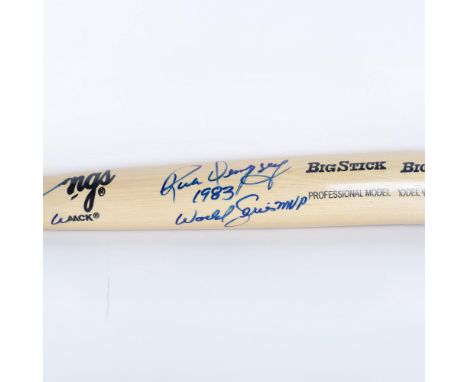 A natural-wood colored Rawlings Big Stick professional model bat signed by World Series MVP, Rick Dempsey. Certificate of Aut