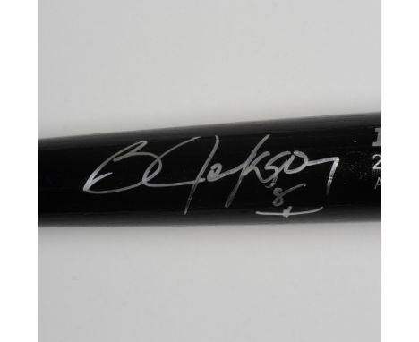 Black Big Stick bat autographed by MLB Kansas City Royals, Chicago White Sox, and California Angels player, Bo Jackson. Dimen