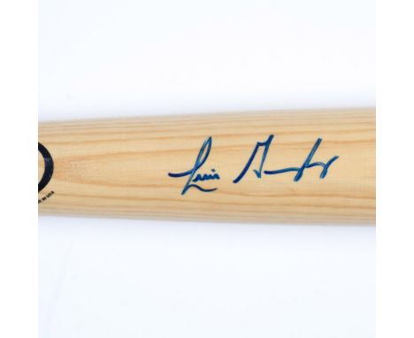 This is a Rawlings Big Stick Luis Gonzalez Professional model bat also autographed in blue by Gonzalez. Dimensions: 34"L x 8"