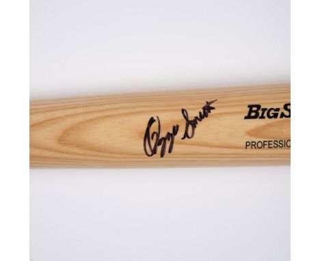 A natural wood-colored Rawlings Big Stick Bat signed by Ozzie Smith in black sharpie. Dimensions: 34"L x 8"Cir. Manufacturer: