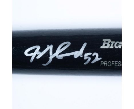 This is a black Rawlings Big Stick Professional model bat signed by Jon Garland in silver. Dimensions: 34"L x 8"Cir. Manufact