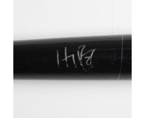 A striking black wooden bat elegantly embellished with silver accents signed by Hanley Ramirez. Rawlings marked. Downtown Spo