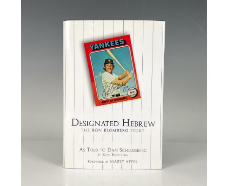 Designated Hebrew: The Ron Blomberg Story, a hardcover book with original dustcover and 176 pages. Autographed by Ron Blomber