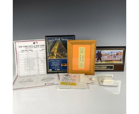 This set of 7 items celebrating the New York Yankees Stadium includes an Old Timers Day pin, an ornament from the groundbreak