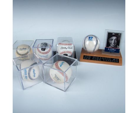This collection includes a commemorative baseball autographed by Mickey Mantle, a commemorative Joe DiMaggio baseball with an