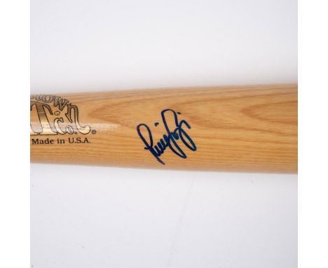 This commemorative baseball bat featured the 1999 New York Yankees 25th World Series Championship and is signed by Yankee pla