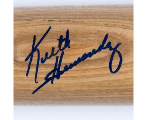 This is a Rawlings Big Stick #232 Professional Model bat signed in blue by Keith Hernandez. Dimensions: 34"L x 8"Cir. Manufac