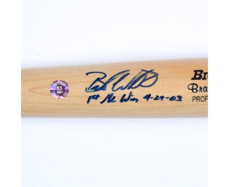This is a Rawlings Big Stick Professional model bat signed by Brandon Webb in blue. Certificate of Authenticity from Fan Fair