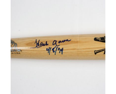HOF Hank Aaron personally signed this bat commemorating the 25th anniversary of his 715th home run. Certificate of authentici
