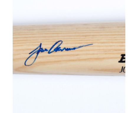 This is a natural wood colored Rawlings Big Stick Jose Canseco model bat marked Devil Rays also hand-signed by Jose Canseco i