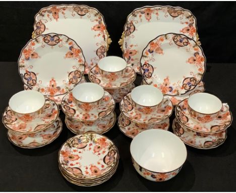 A late 19th/early 20th century Royal Crown Derby 3401 Imari pattern part tea service comprising cake plates, side plates, sug