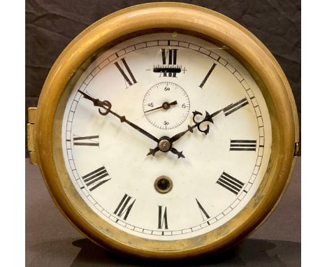 A brass marine timepiece, 14.5cm enamel clock dial with Roman numerals, subsidiary seconds dial, single winding hole, 19.5cm 