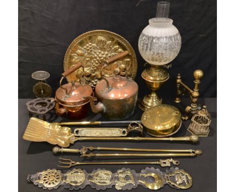 A Victorian copper kettle; another; a brass oil lamp, acid etched lobed globular shade, 51cm overall; a pair of brass fire ir