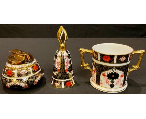 A Royal Crown Derby 1128 Imari pattern loving cup, first quality; a 1128 pattern candle snuffer, first quality; a 1128 patter