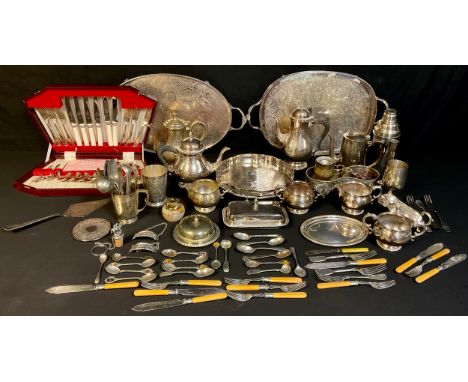 An EPNS cocktail shaker, four piece tea service on tray, sauce boat, oval card waiter, circular galleried tray, butter dish, 