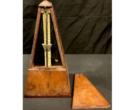 An early 20th century mahogany metronome 