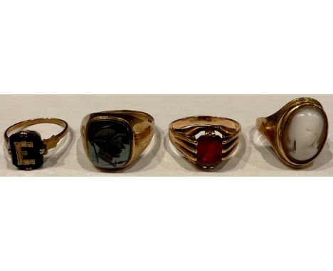 A Victorian 9ct gold mourning ring, applied with the letter E, size L, 1.8g; a 9ct gold seal ring with carved haematite Roman