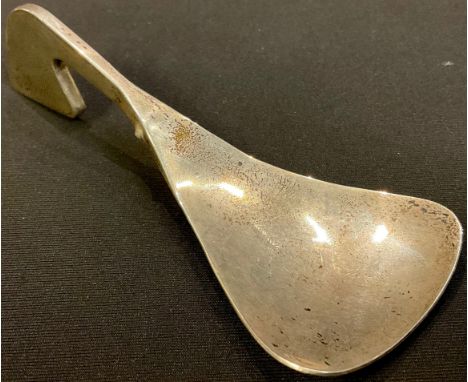 A Modernist silver caddy spoon, London 1975 