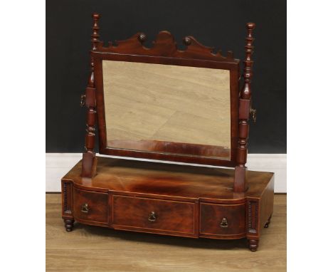 A mahogany Vauxhall dressing mirror, the breakfront base with three small drawers, 59cm high, 55cm, 26cm deep 