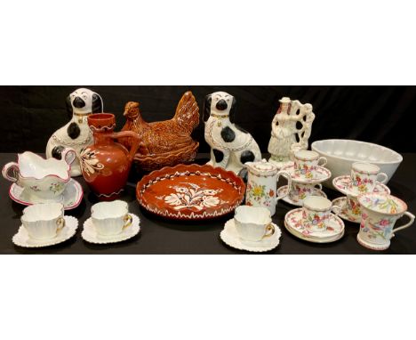 An Aynsley part coffee set, printed with summer flowers, pattern number A4117, early 20th century; a pair of Staffordshire ma