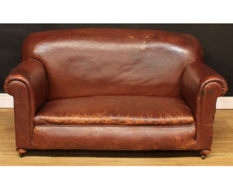 An Art Deco leather cigar club sofa, 79cm high, 152cm wide, the seat 107cm wide and 57cm deep 