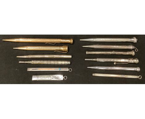 An Edwardian silver propelling pencil, set with turquoise, Chester 1902; another, Birmingham 1939; others silver, etc; a Ster