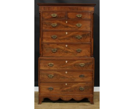 A George III mahogany and burr accented chest on chest, moulded outswept cornice above two short and three long graduated coc