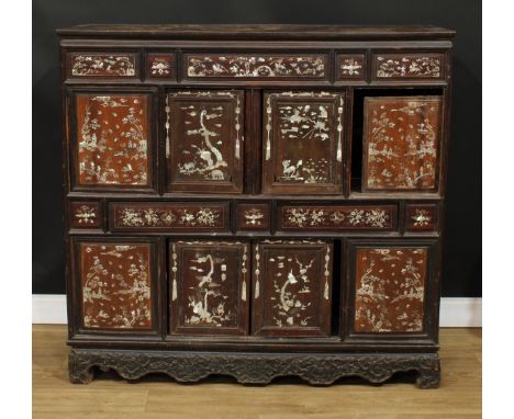 A Chinese hardwood and mother of pearl marquetry side cabinet, of Japanese Shibayama shodana form, inlaid throughout with war