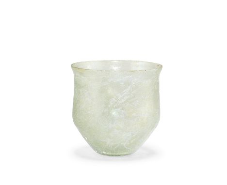  A large Roman light green glass beaker Circa 4th Century A.D.10cm high, 10.3cm diam.Footnotes:Provenance:Louis-Gabriel Bello