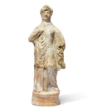 Greek Tanagra Terracotta Statue of a Woman sold at auction on 25th