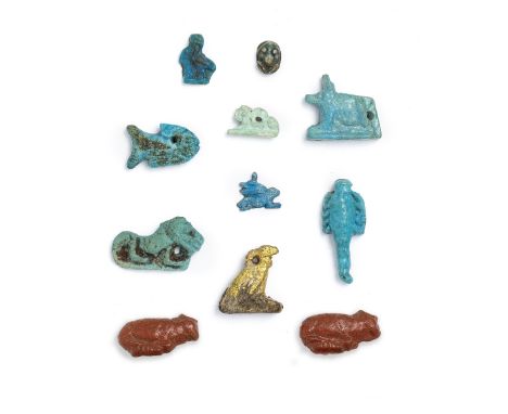  Ten small Egyptian faience animal amulets and a gilt wood vulture amulet Late Period, circa 664-332 B.C.3cm long max.  (11)F
