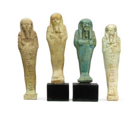  Four Egyptian glazed faience shabtis Late Period, 26th-30th Dynasty, circa 664-343 B.C.8.8cm-11.5cm high  (4)Footnotes:Prove