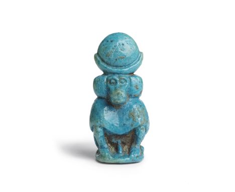  An Egyptian turquoise faience amulet of Thoth as a baboon Late Period, circa 664-332 B.C.4.2cm highFootnotes:Provenance:with
