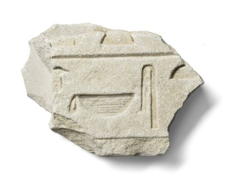  An Egyptian limestone relief fragment with hieroglyphs New Kingdom, circa 1550-1069 B.C.22cm x 16cmFootnotes:Provenance:Coll