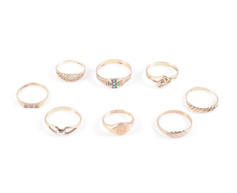 A GROUP OF EIGHT GOLD RINGS, including a 15 carat gold ring set with seed pearl and turquoise, the other seven rings 9 carat 