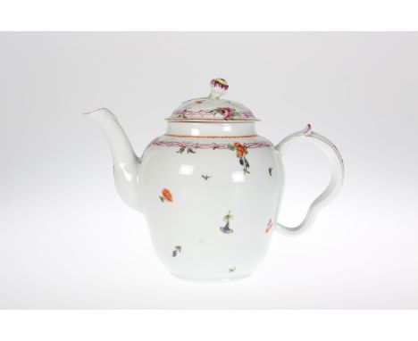 A CHAMPION'S BRISTOL HARD-PASTE PORCELAIN TEAPOT AND COVER, CIRCA 1775, painted with scattered flowers, the moulded handle pu