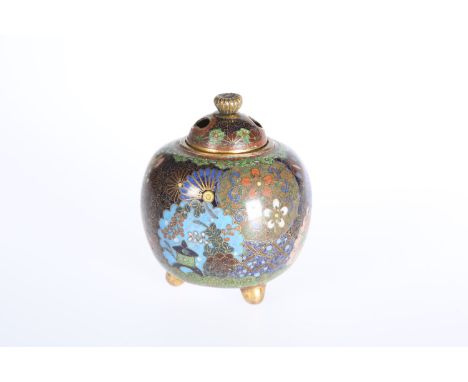 A SMALL CHINESE CLOISONNE ENAMEL INCENSE JAR AND COVER, of spherical form, with domed pierced cover and raised on ball feet, 