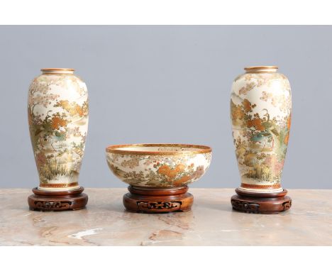A GROUP OF JAPANESE SATSUMA, c. 1900, comprising: a pair of vases each painted with peacocks in a blossom-filled landscape, s