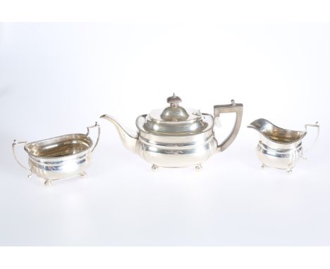 AN EDWARDIAN THREE PIECE SILVER TEA SERVICE, C.S. HARRIS &amp; SONS LTD, LONDON 1909 AND 1910, in the Regency taste, each pie