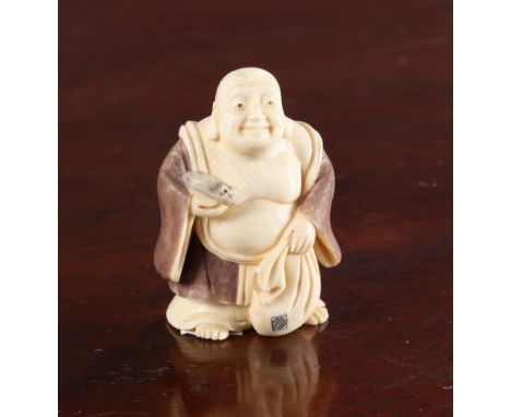 A JAPANESE STAINED IVORY NETSUKE OF HOTAI, Meiji period, modelled with rat and sack, signed. 53mm