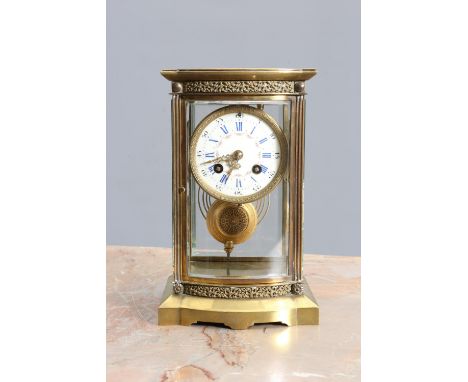A LATE 19th CENTURY FRENCH BRASS FOUR-GLASS MANTEL CLOCK, the white enamel dial painted with a floral band and with Roman and