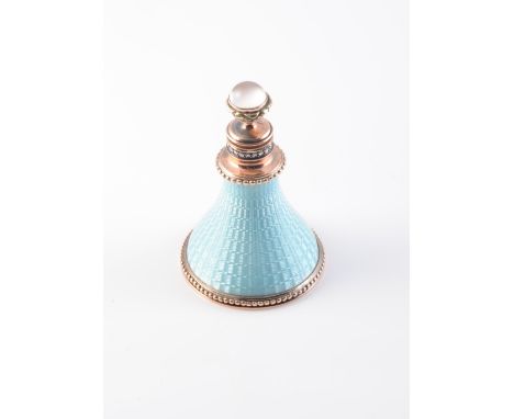 A CONTINENTAL GOLD COLOURED, ENAMEL AND GEM SET SCENT BOTTLE, bearing pseudo Russian hallmarks, the cover with moonstone set 