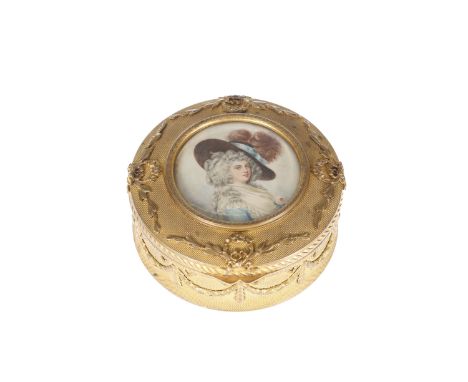 A CONTINENTAL GILT-METAL CIRCULAR BOX, LATE 19TH CENTURY, the hinged lid centred by a portrait miniature on ivory of a figure