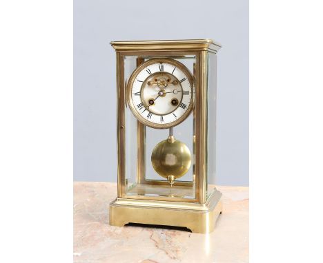 A BRASS CASED FOUR-GLASS MANTEL CLOCK, CIRCA 1890, the white enamel chapter with Roman numerals, recessed dial centre with vi