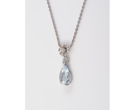 AN AQUAMARINE AND DIAMOND SET PENDANT, the pear cut aquamarine collet set on an articulated link to the bottom of a flower he