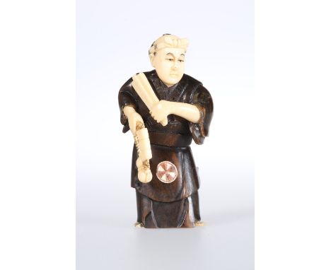 A JAPANESE IVORY AND WOOD FIGURAL NETSUKE, Meiji period, modelled holding a gourd and fan, signed. 6.5cm