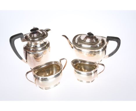 A SILVER FOUR PIECE TEA SERVICE, Harry Atkin, Sheffield 1942, comprising teapot, hot water jug, cream jug and sugar bowl. Gro